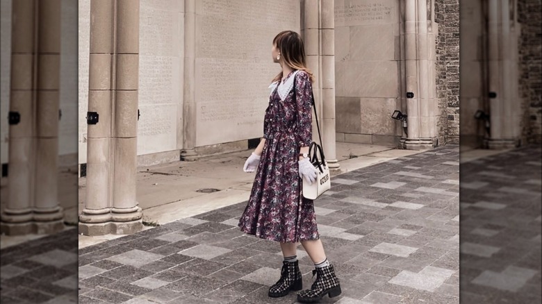 Girl wearing dress, combat boots