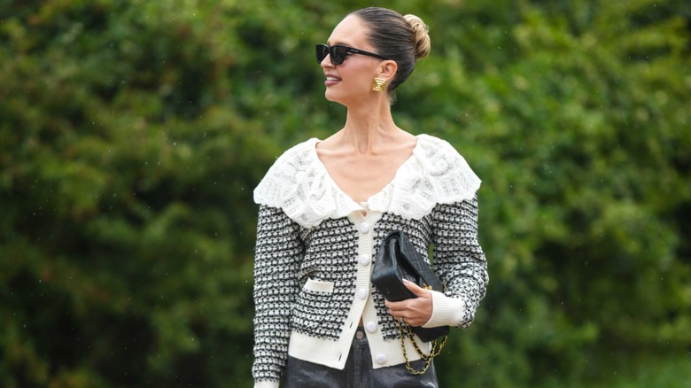 woman wearing frilled cardigan