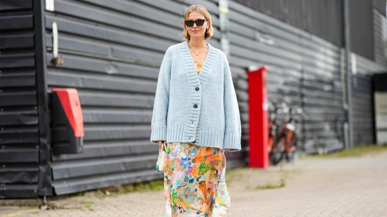 woman wearing oversized cardigan