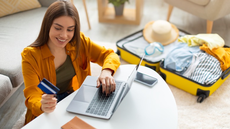 Woman credit card booking