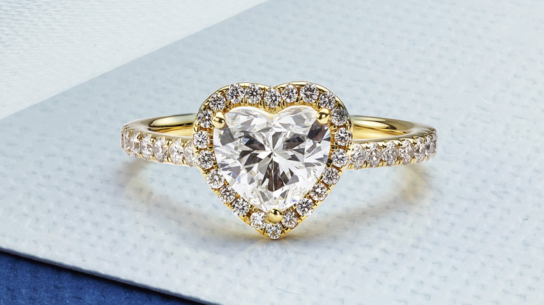 Heart-shaped yellow gold halo ring