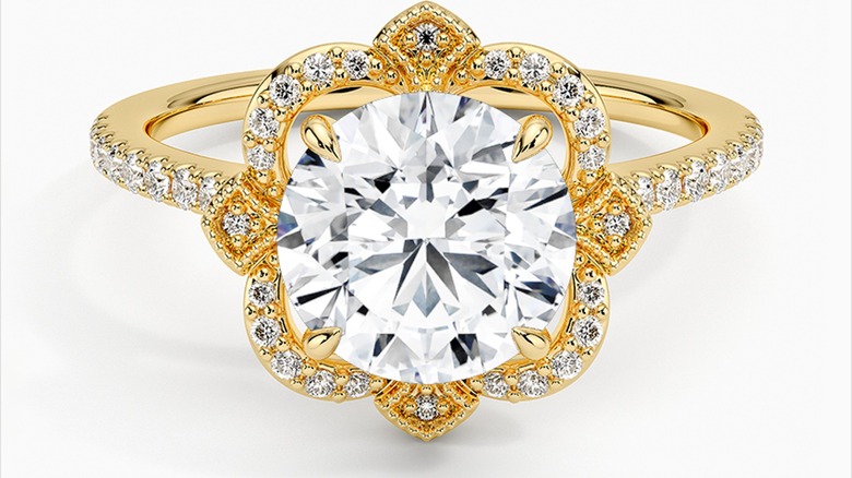 Ornately designed halo diamond ring