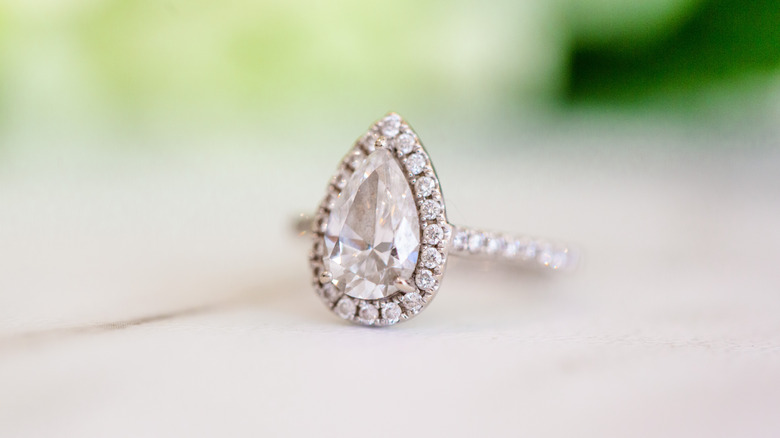 Pear-shaped halo engagement ring