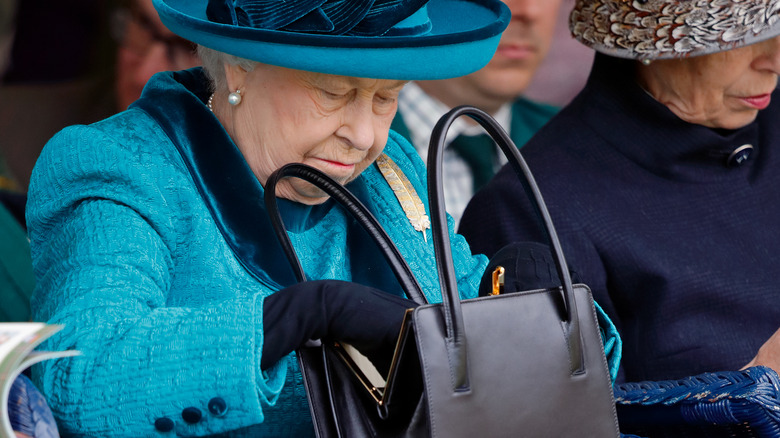 Queen Elizabeth with Launer handbag