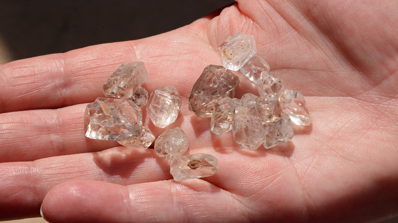 Quartz crystals in hand