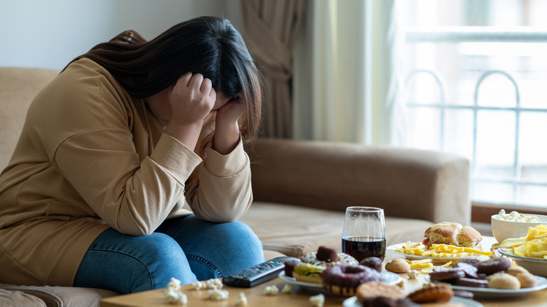 woman feeling guilty over food