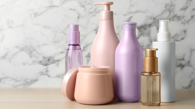 Haircare products sitting on a counter.