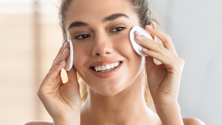 Woman using cotton pads