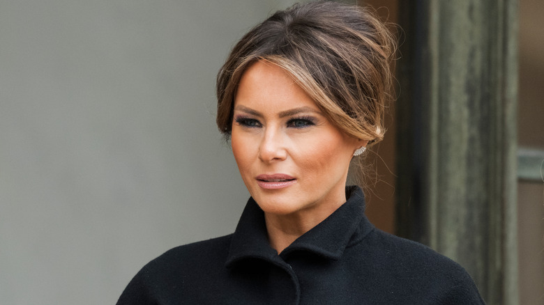 Melania Trump in black coat