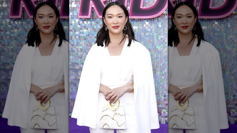 Teresa Hsiao wearing draped white blazer