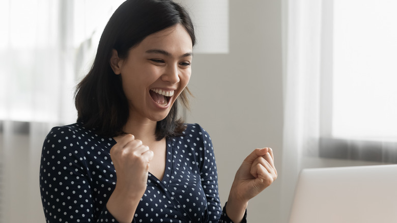 woman looking at computer