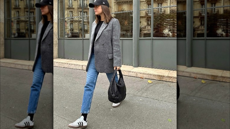 Woman wearing Adidas Samba sneakers