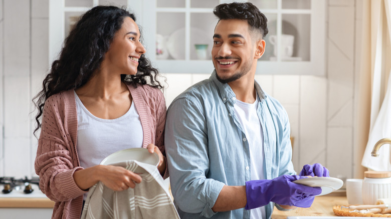 couple doing dishes together