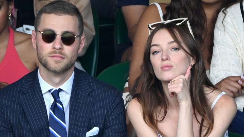 Cameron Fuller and Phoebe Dynevor at a tennis match