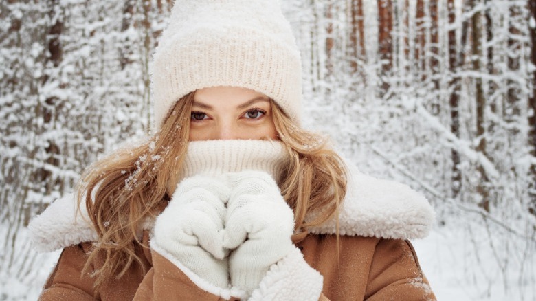 Woman bundled up winter clothes