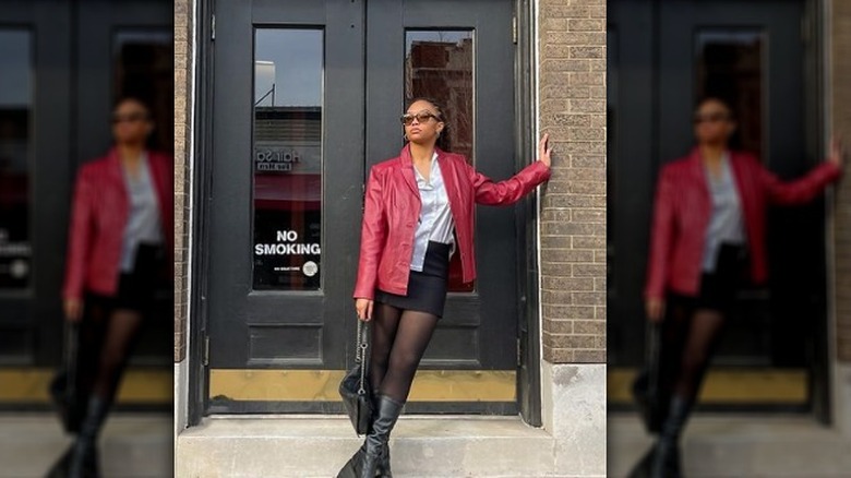 Black woman red leather jacket