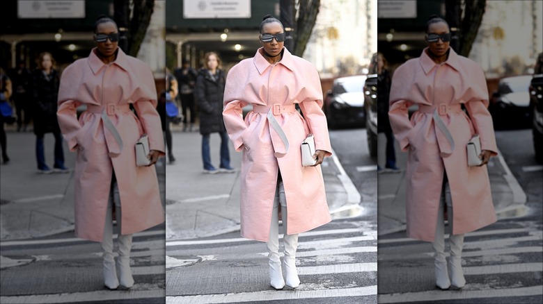 woman wearing pink leather trenchcoat