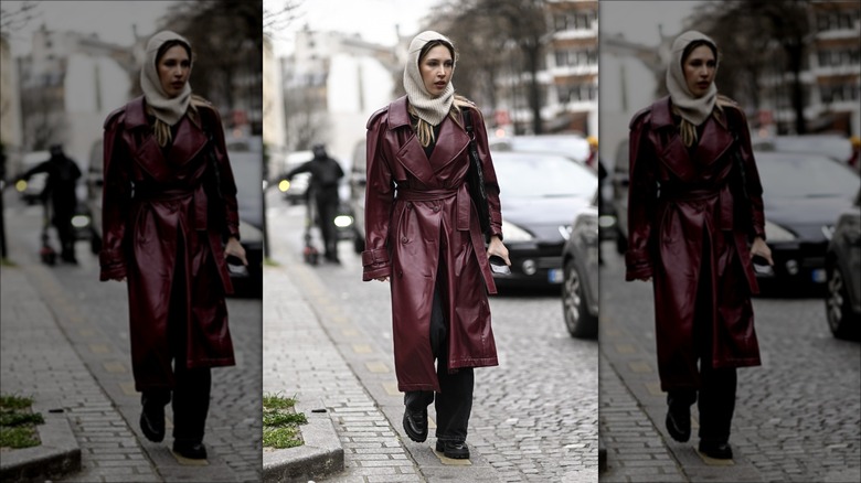 woman wearing maroon leather trench