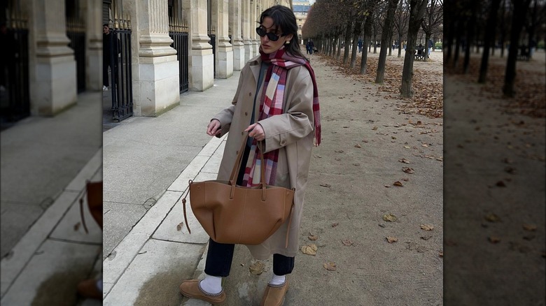 woman in coat and colorful scarf