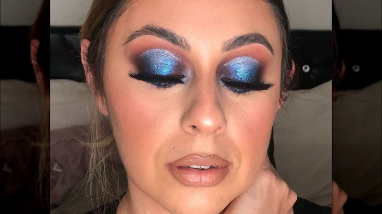 Bronze lips and metallic blue shadow