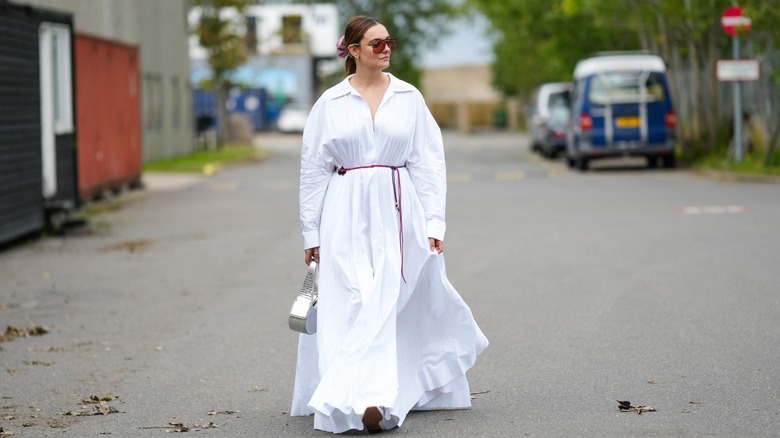 woman wearing white maxi dress