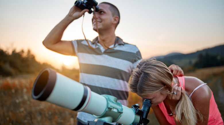 Couple stargazing outside