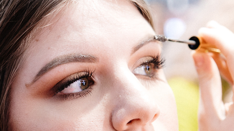 Close-up of brow gel application