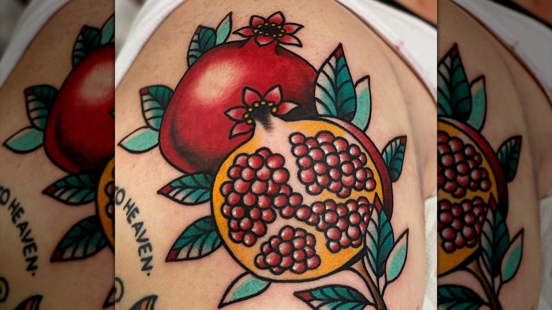 neo-traditional pomegranate tattoo