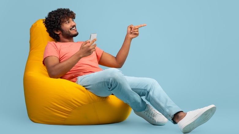 Man relaxed in bean chair