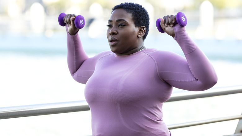 Woman lifting weights