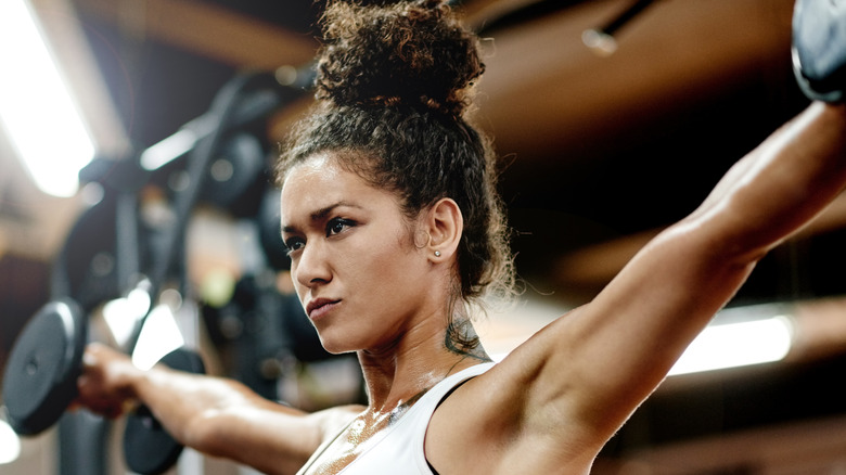 woman lifting weights