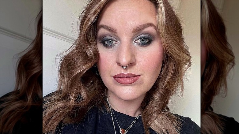 woman with messy makeup look