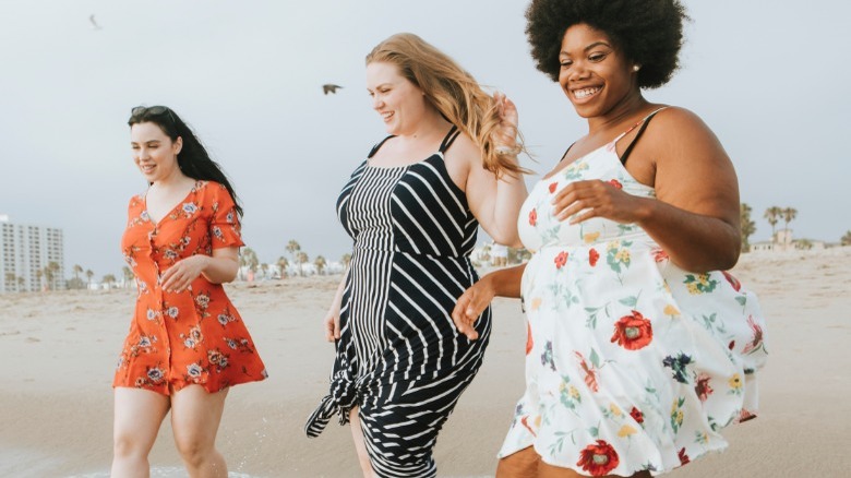 Women in bathing suits at beach