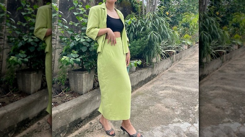 Woman in lime green skirt suit