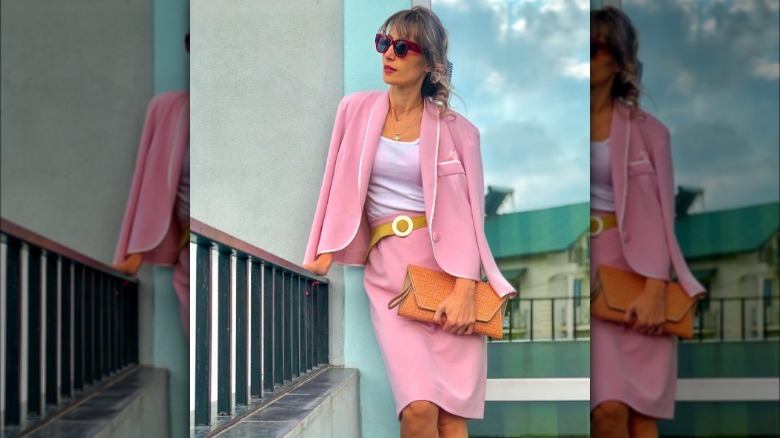 Woman in pink skirt suit