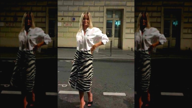 Woman in zebra print midi skirt