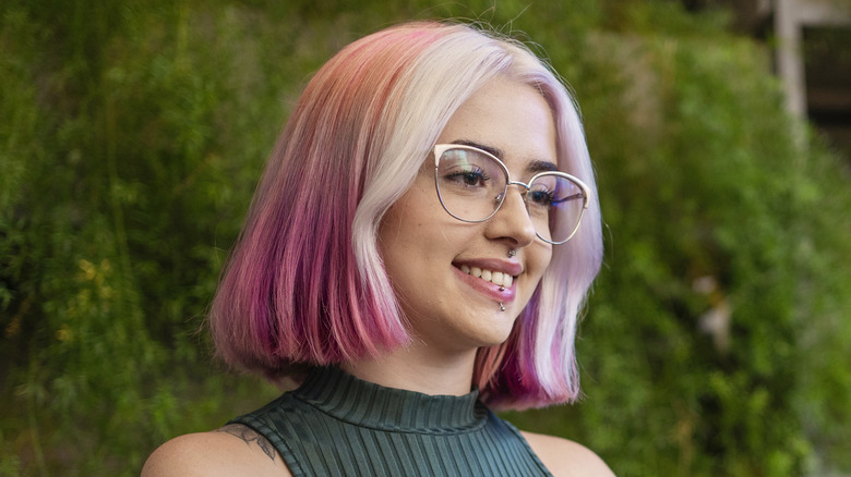 Pink hair woman with white streaks