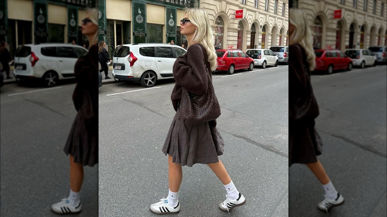 White, gray sneakers with midi skirt