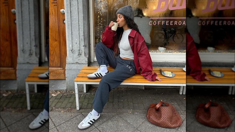 White sneakers with red jacket