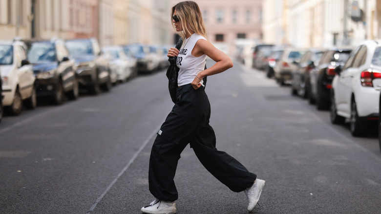 Woman in sweats and sneakers