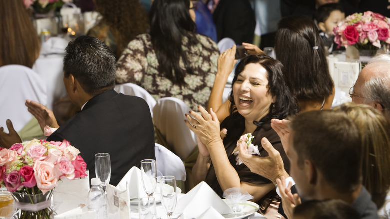 Wedding guests clapping