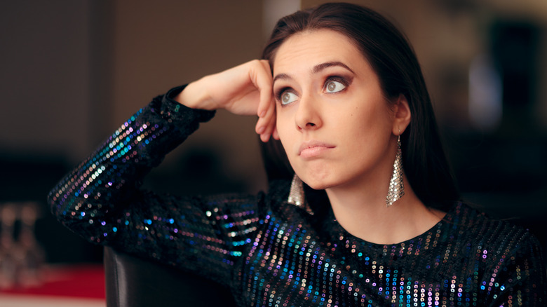 Upset woman wearing sequins