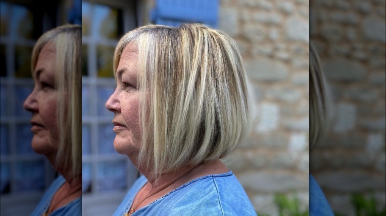 Woman models stacked mid-bob