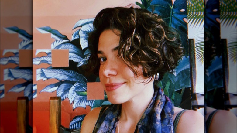 A woman with short wavy hair