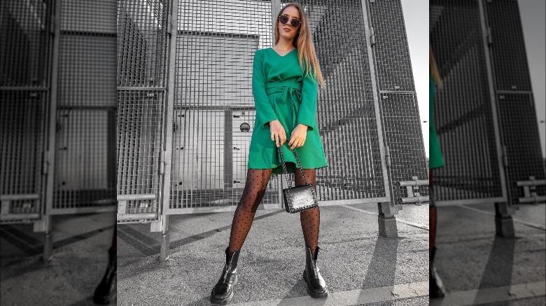 Girl wearing grunge boots with dress