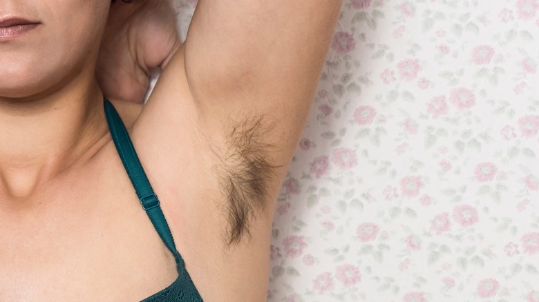 A woman with armpit hair