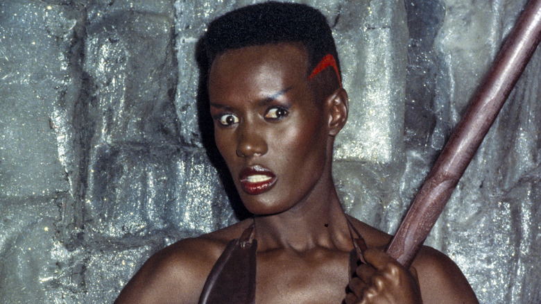 grace jones holding stick