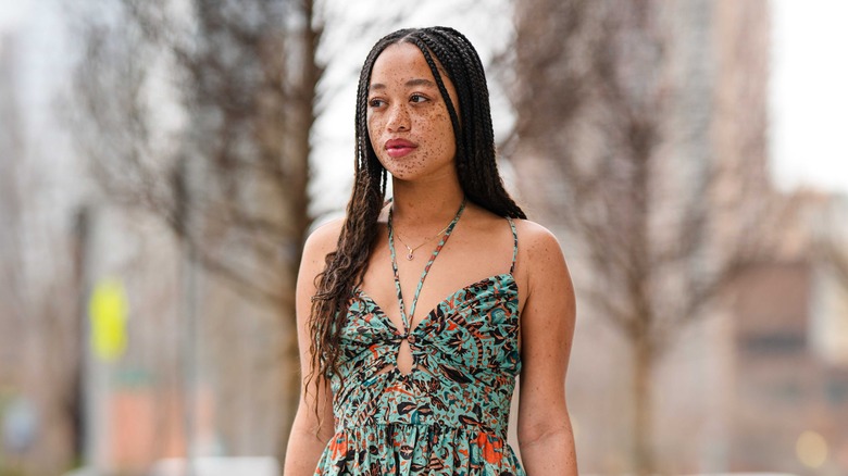 Woman with long micro braids 