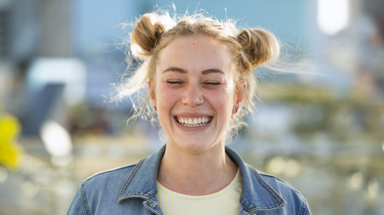 Blond woman with space buns