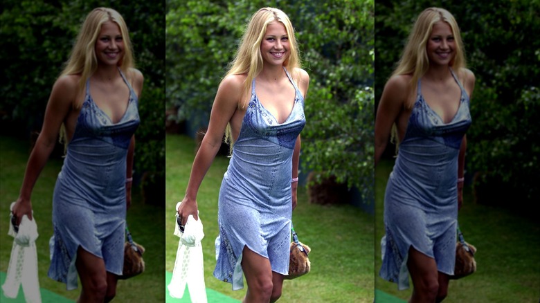 Anna Kournikova in a faux denim Dior dress at a Buckingham Palace tennis event.